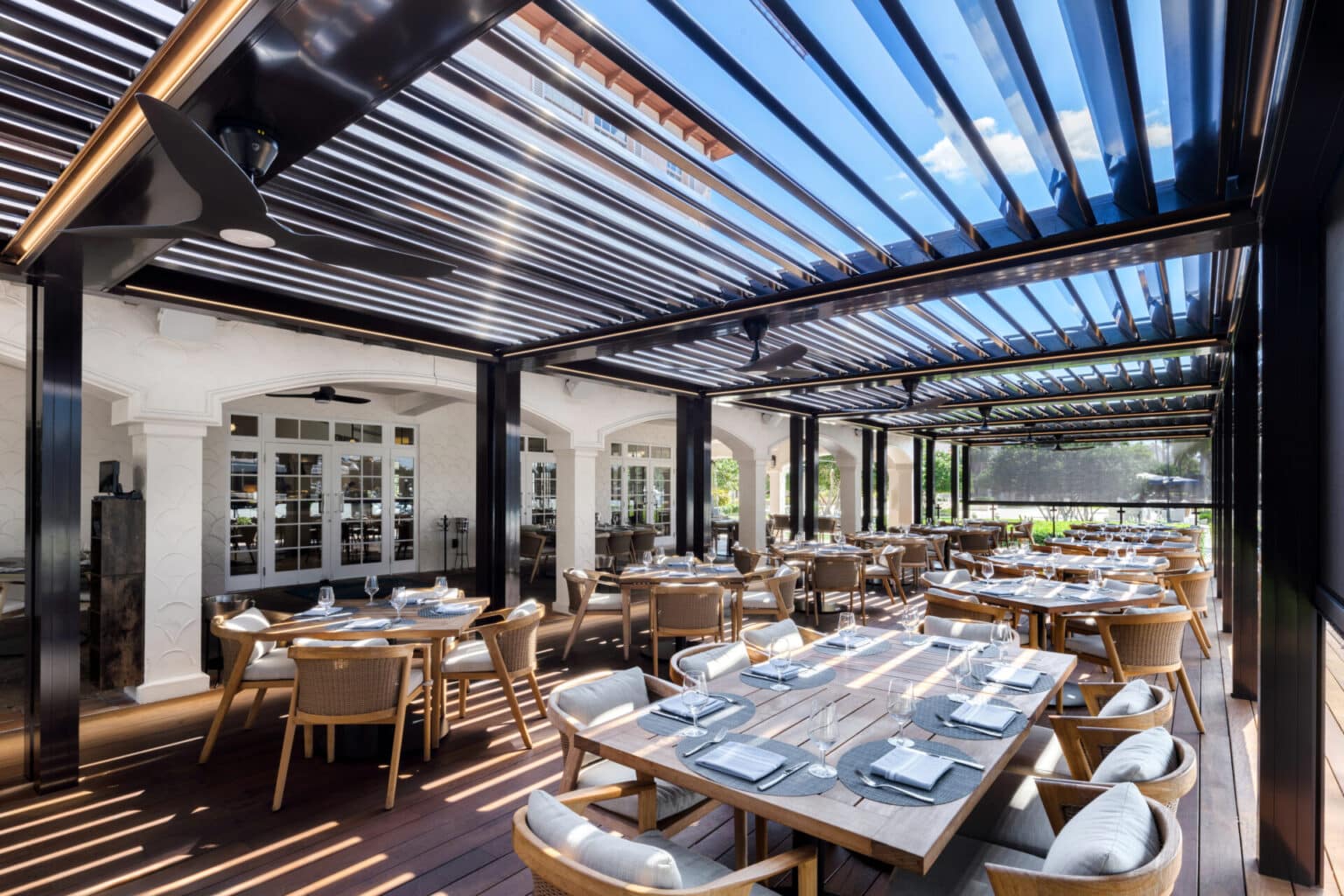 Elevating Outdoor Dining with Louvered Roof Pergolas